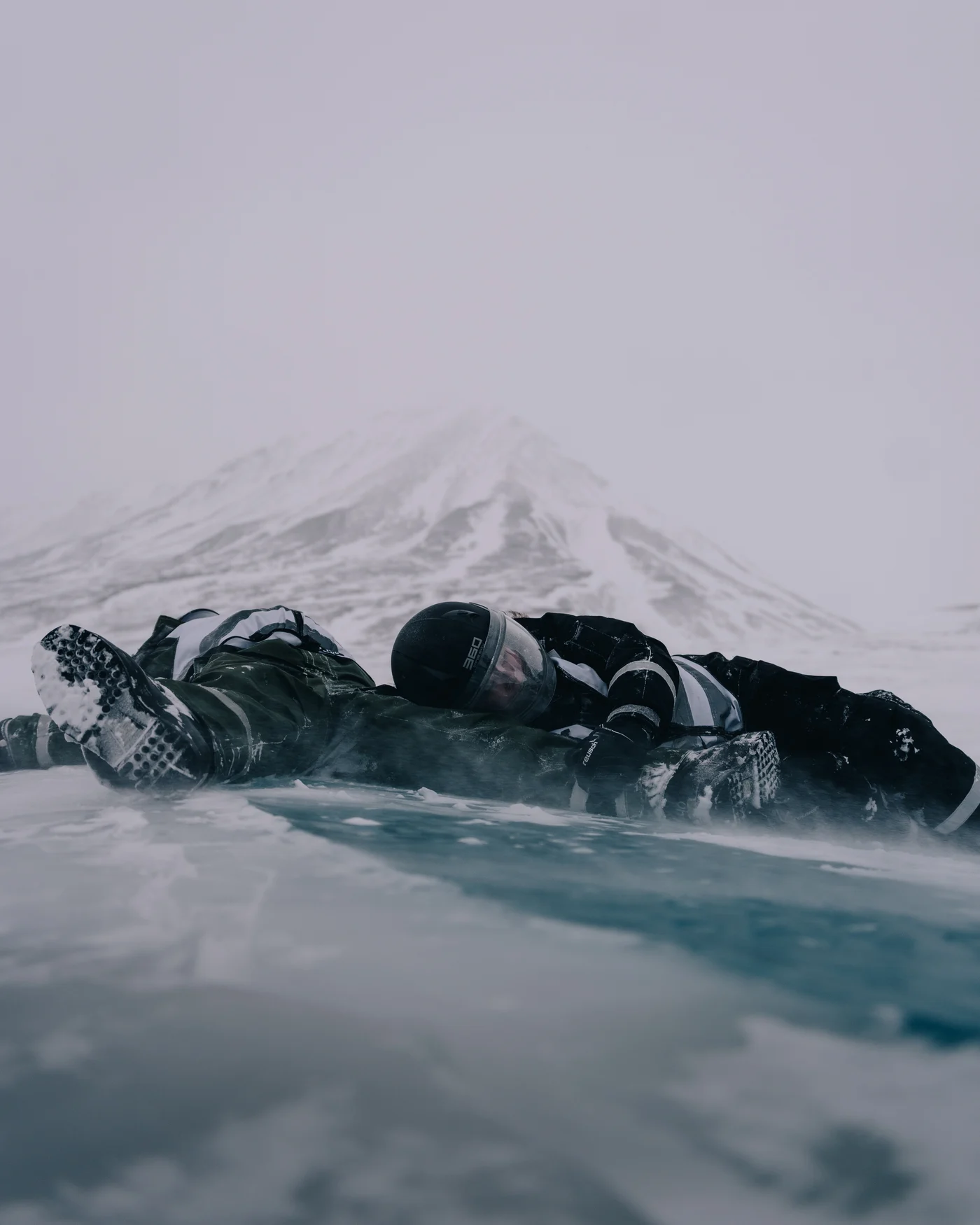 Ancient blue ice, clear enough to read straight down into.