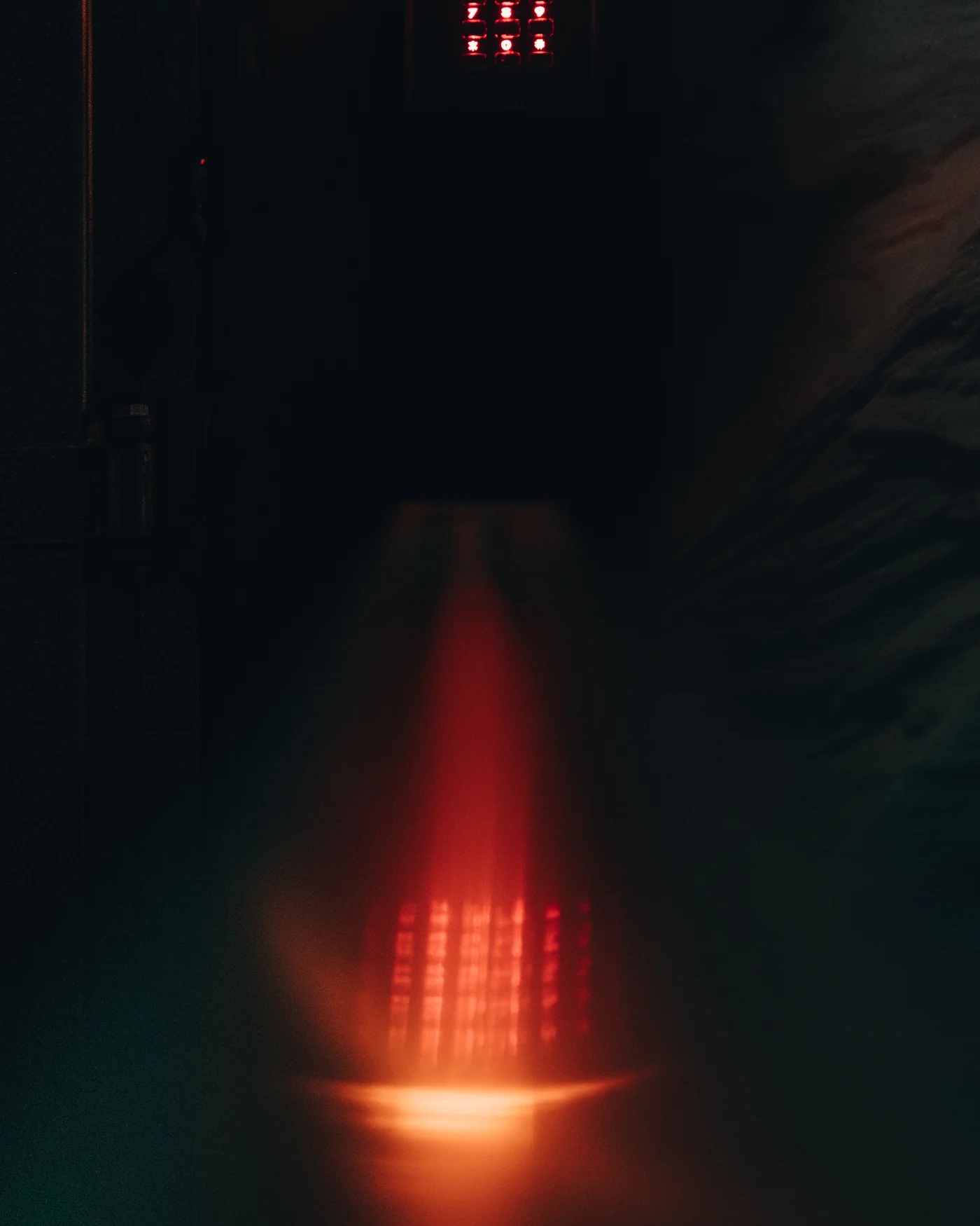 The Seed Vault's light, caught as a reflection. I got to put a hand on its door.